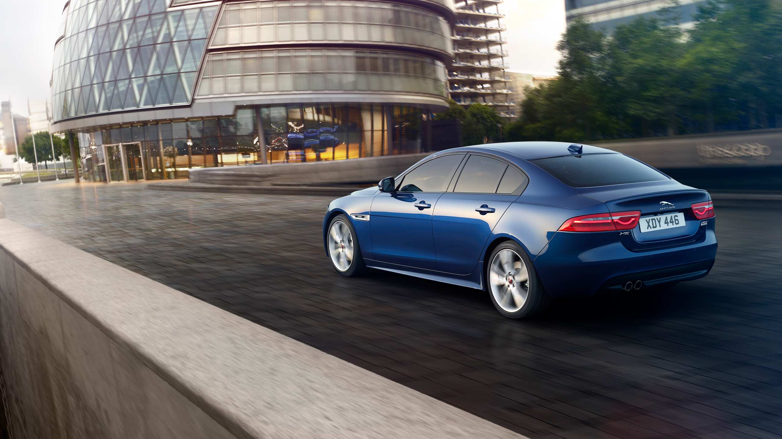 Jaguar XE running on road